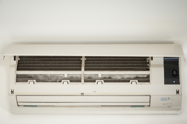 ice build up in ductless air conditioner depicting frozen evaporator coils