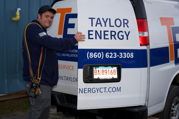 Taylor Energy HVAC technician providing expert cooling services