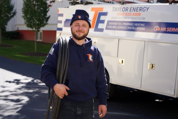 Taylor Energy HVAC technician getting ready for client maintenance