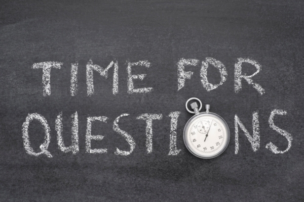 time for questions written using chalk and a pocket watch depicting FAQs about leaky air ducts