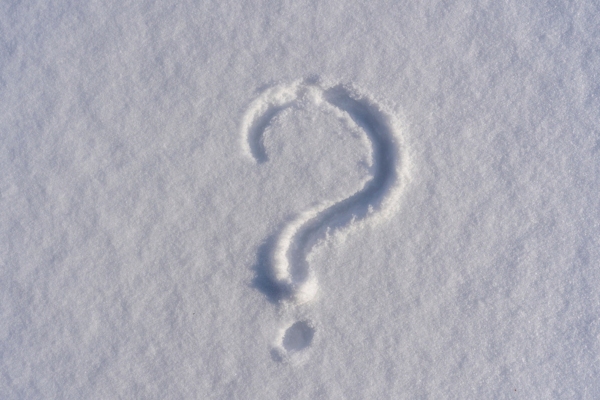 question mark on snow depicting FAQs about furnace short cycling